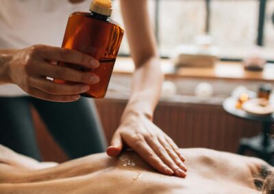Professional spa massage using essential oils for ultimate relaxation and self-care.